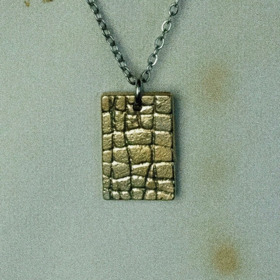 THE SNAKESKIN PENDANT